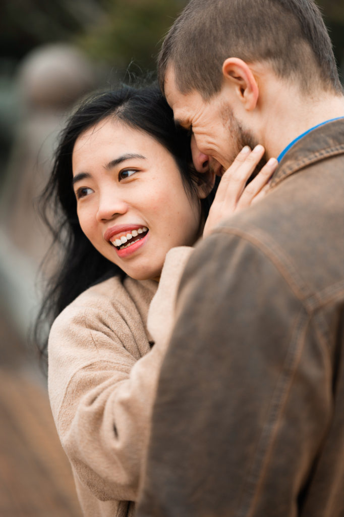 Couple lovingly embrace.