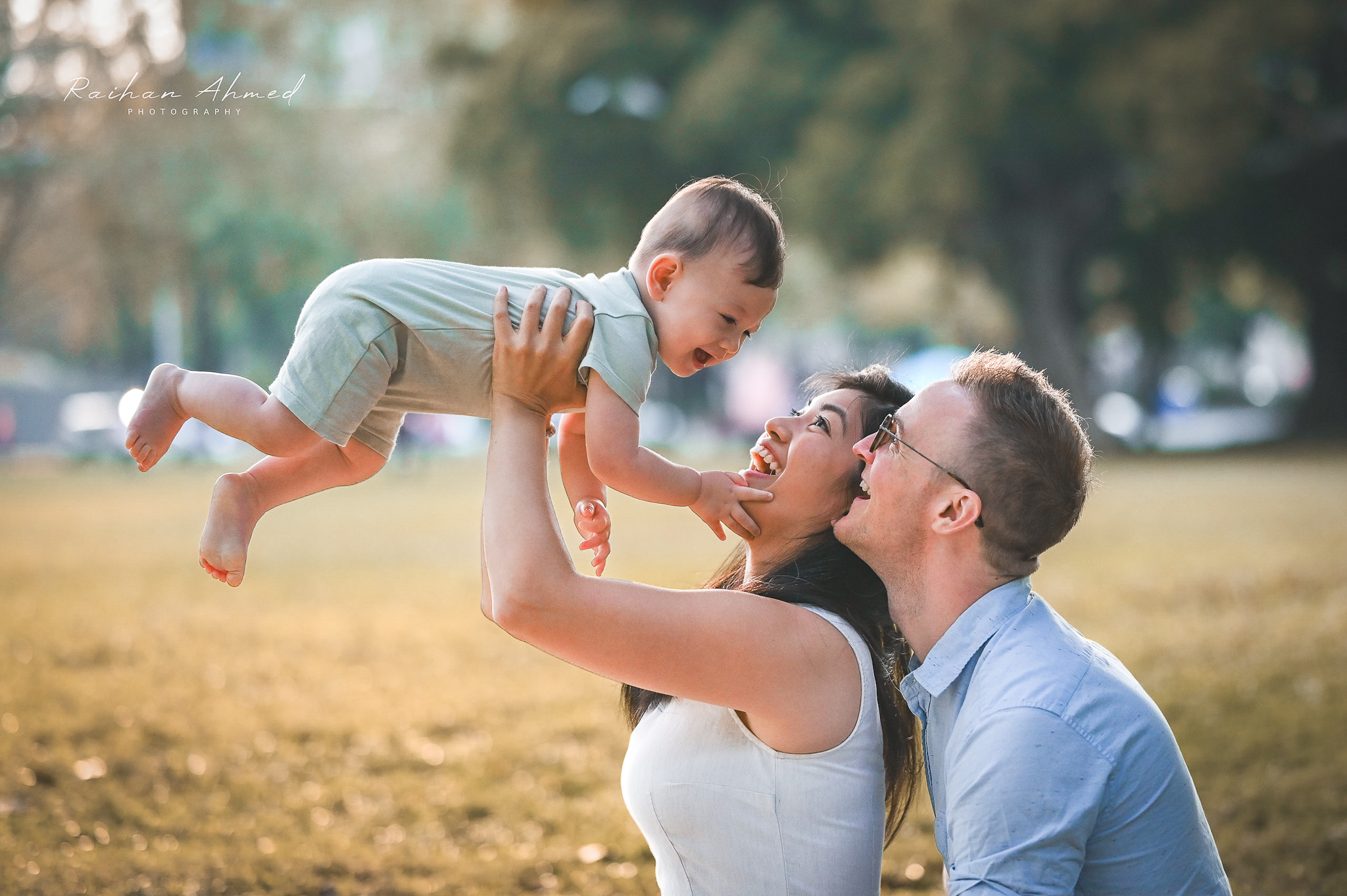 Mother and father with smiling child